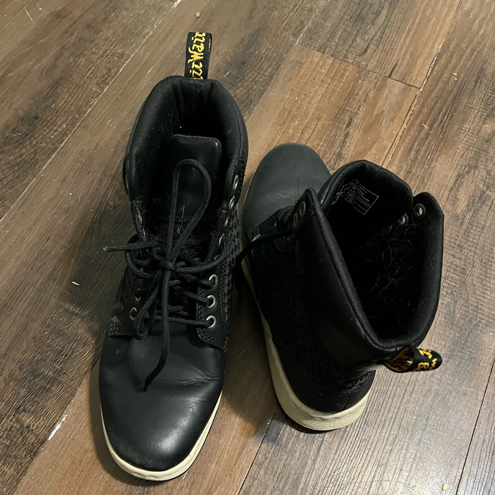 Black and white Dr. Martens.